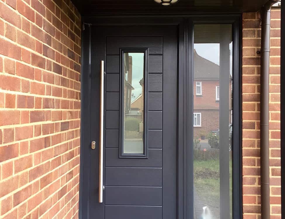 Modern black composite front door installation